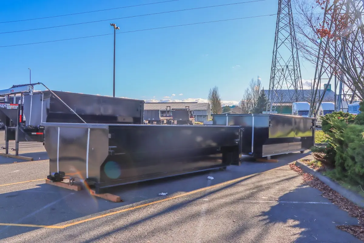 Roll-off dumpster ready for waste disposal at job site for Demolition Dumpster Rental in Ocean City